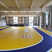 প্ৰি-ফেব্ৰিকেটেড ইনড'ৰ স্প'ৰ্টছ-নিৰ্দিষ্ট পৃষ্ঠ স্তৰ